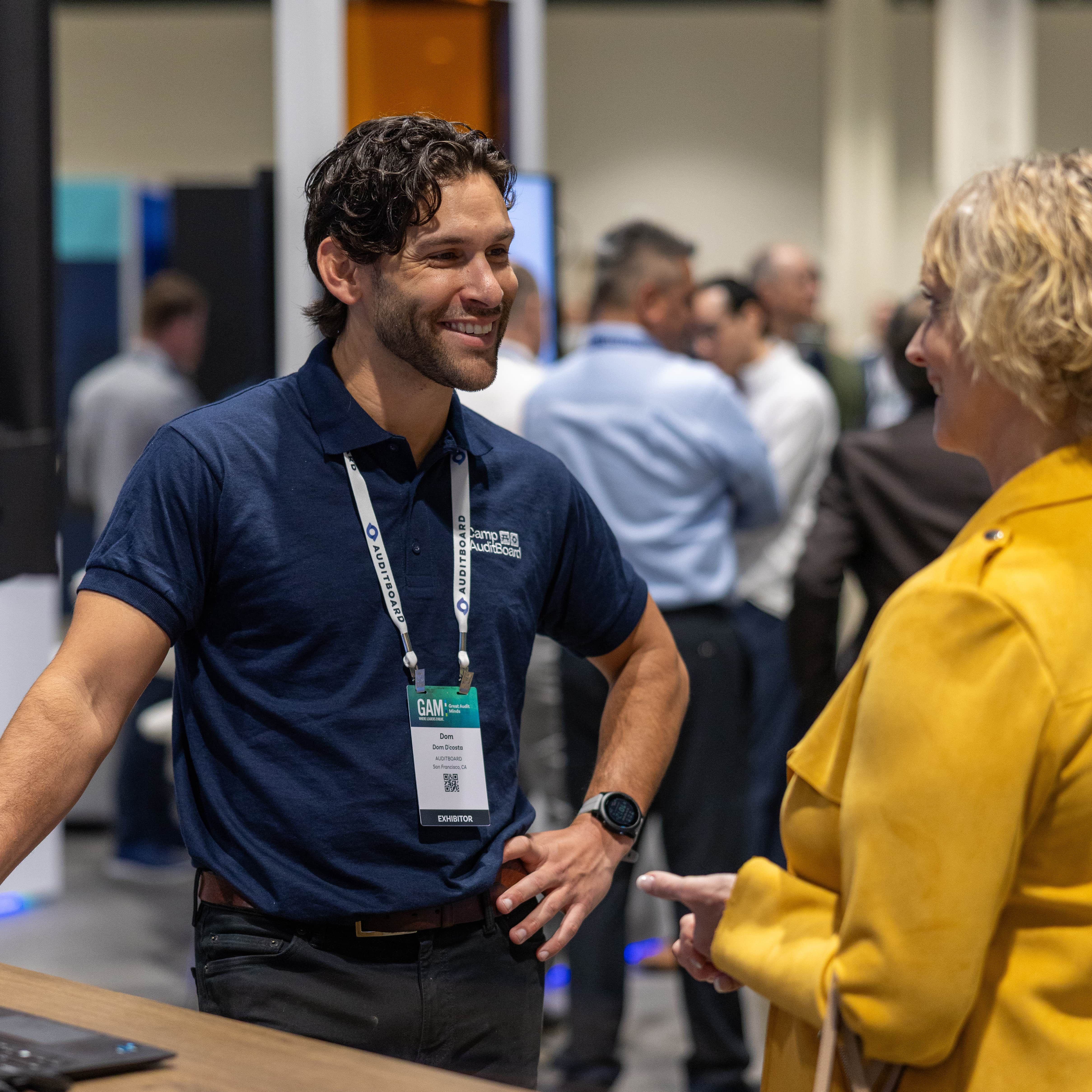 AuditBoard specialist demoing product at an industry event